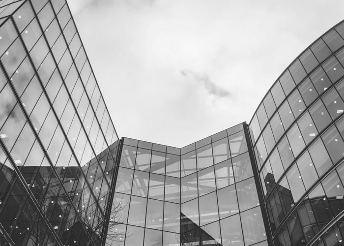 A black and white photo of some windows